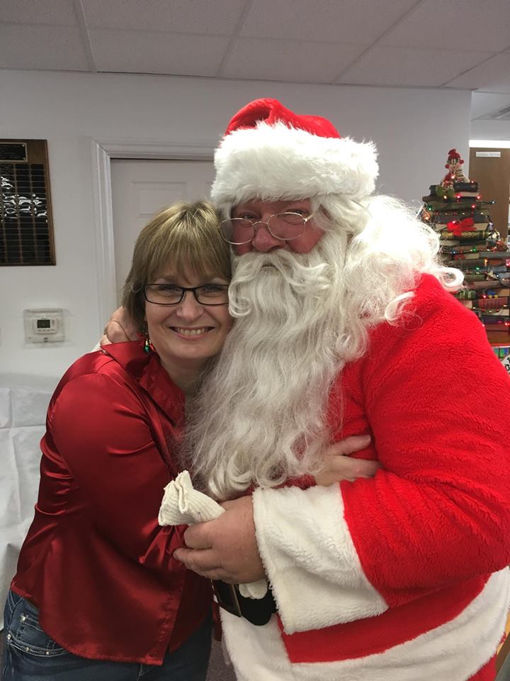 Alicia hugging santa 2016.jpg